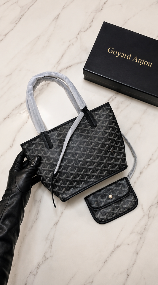 Goyard Saint Louis PM Tote in black, featuring the brand's signature chevron monogram print