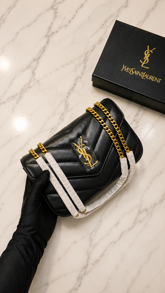 Saint Laurent Small Loulou shoulder bag is crafted from black chevron-quilted lambskin with gold-toned hardware