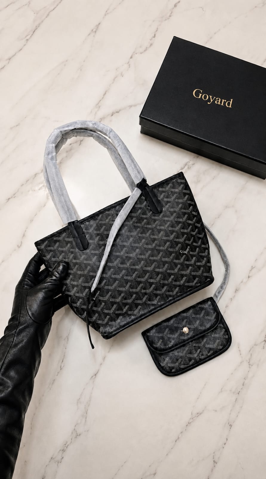 Goyard Saint Louis PM Tote in black, featuring the brand's signature chevron monogram print